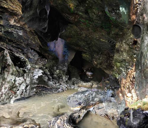 A photographic and video collage extrapolating digital glitches on a real-life photograph of a cave. The computer-generated artifacts seem to be taking over the natural space, transporting the viewer to a chaotic augmented reality. A murky stream flows freely through both layers of the image, appearing to transcend the borders between organic and digital. The darkness deep within the cave invites the viewer to descend into a hidden world where precisely drawn borders are no longer possible.